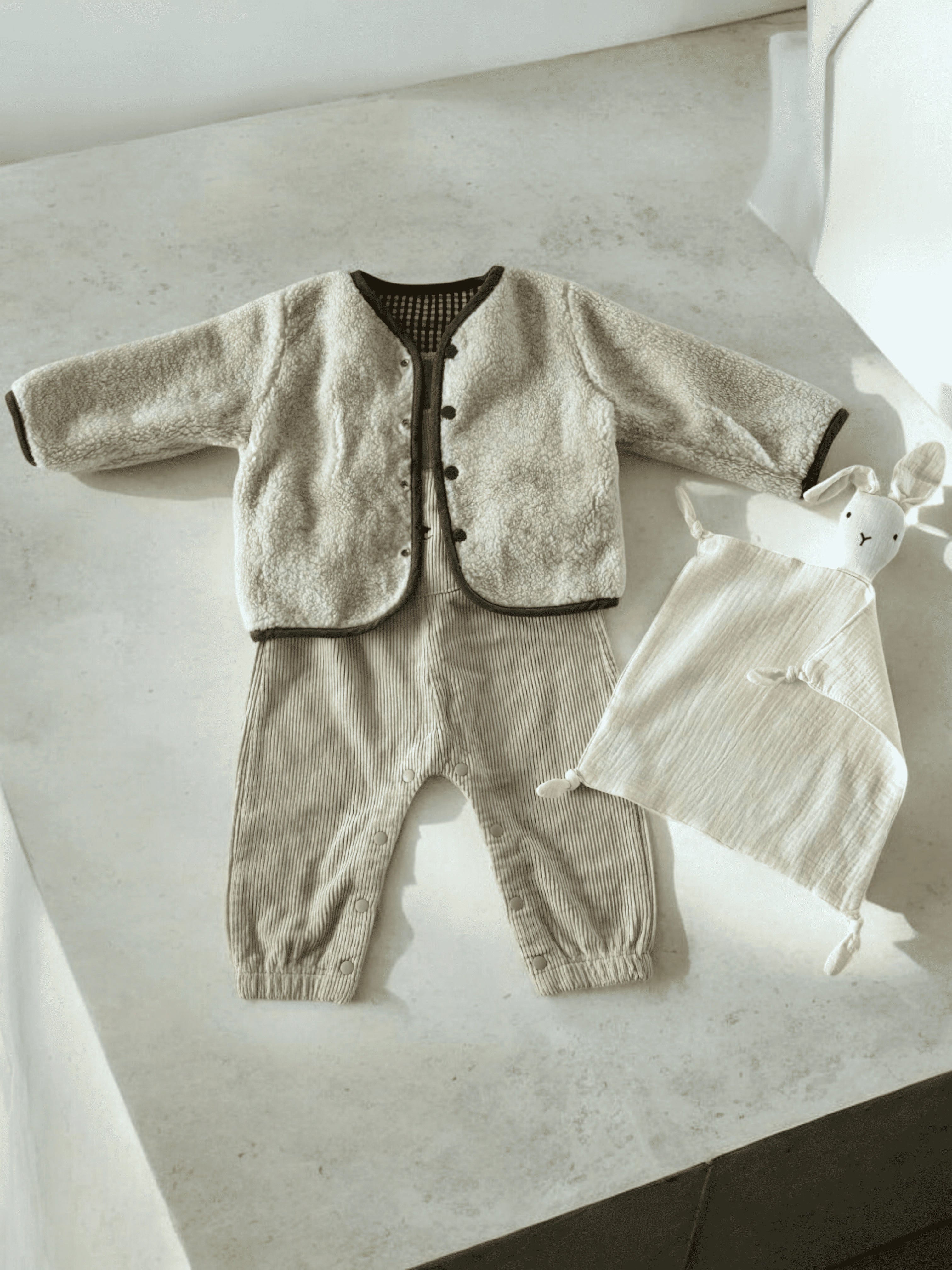 Confort Douillet Et Deux Looks en Un - Le Manteau Douillet Réversible Imitation Fourrure