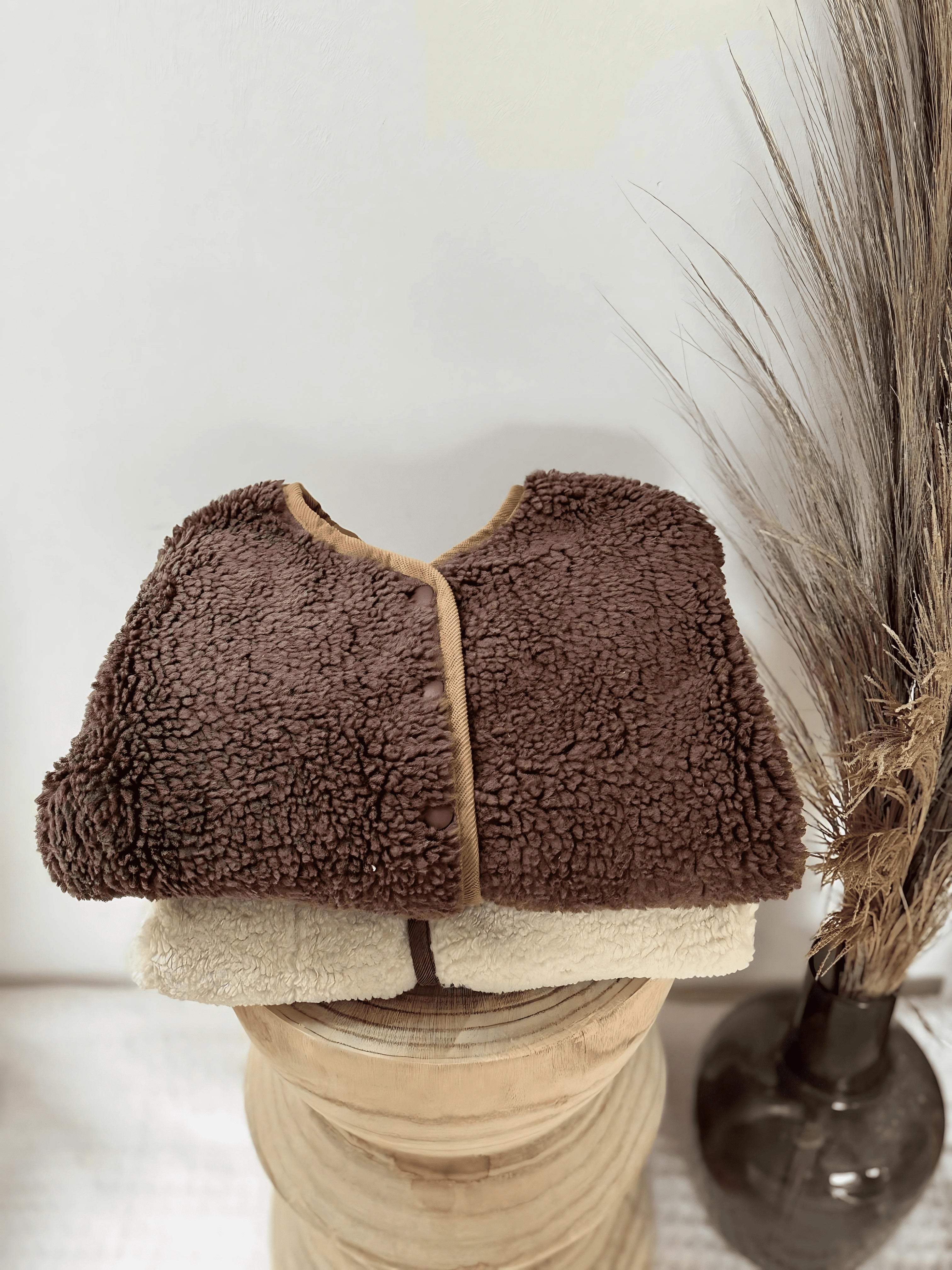 Confort Douillet Et Deux Looks en Un - Le Manteau Douillet Réversible Imitation Fourrure