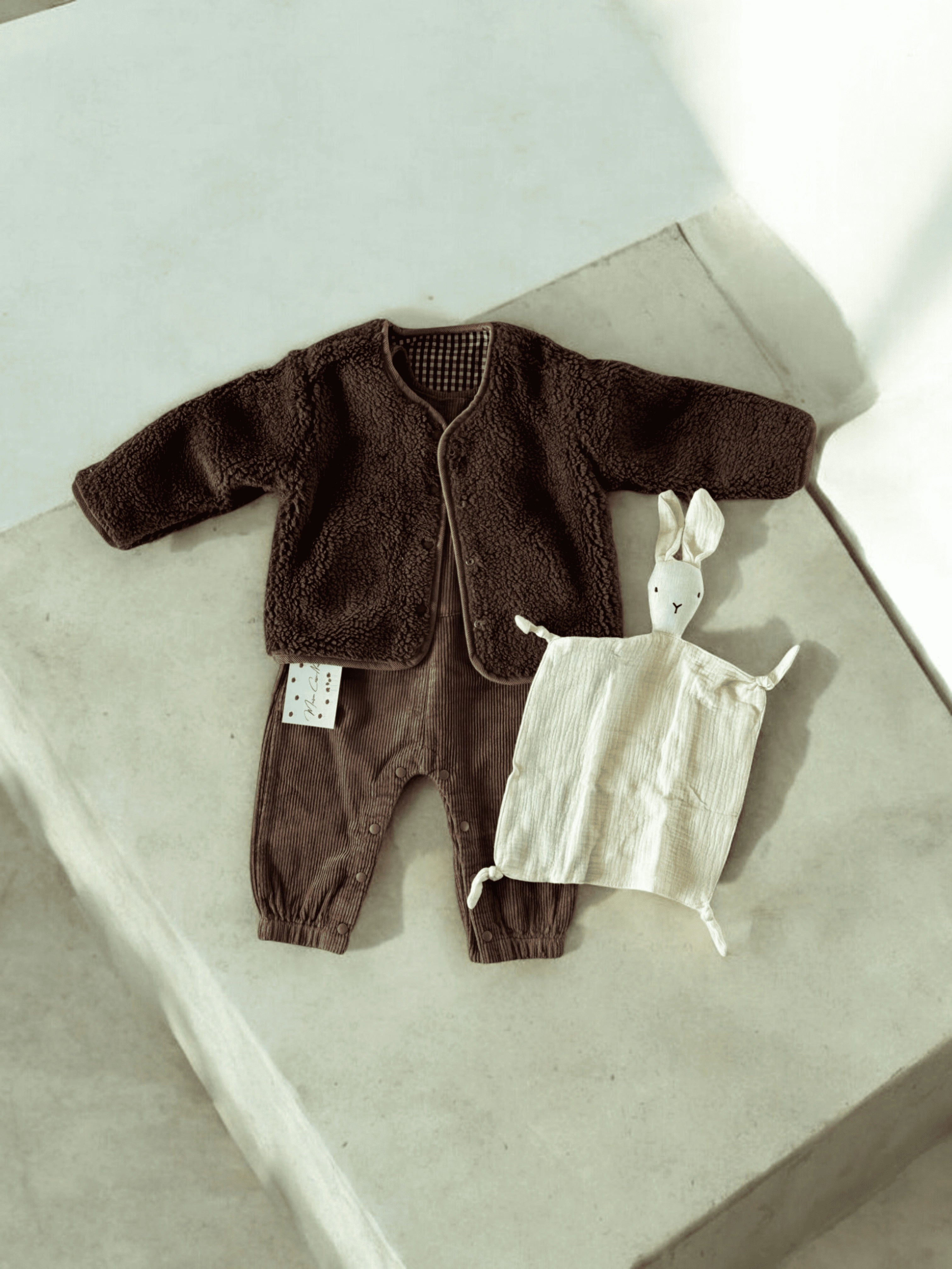 Confort Douillet Et Deux Looks en Un - Le Manteau Douillet Réversible Imitation Fourrure