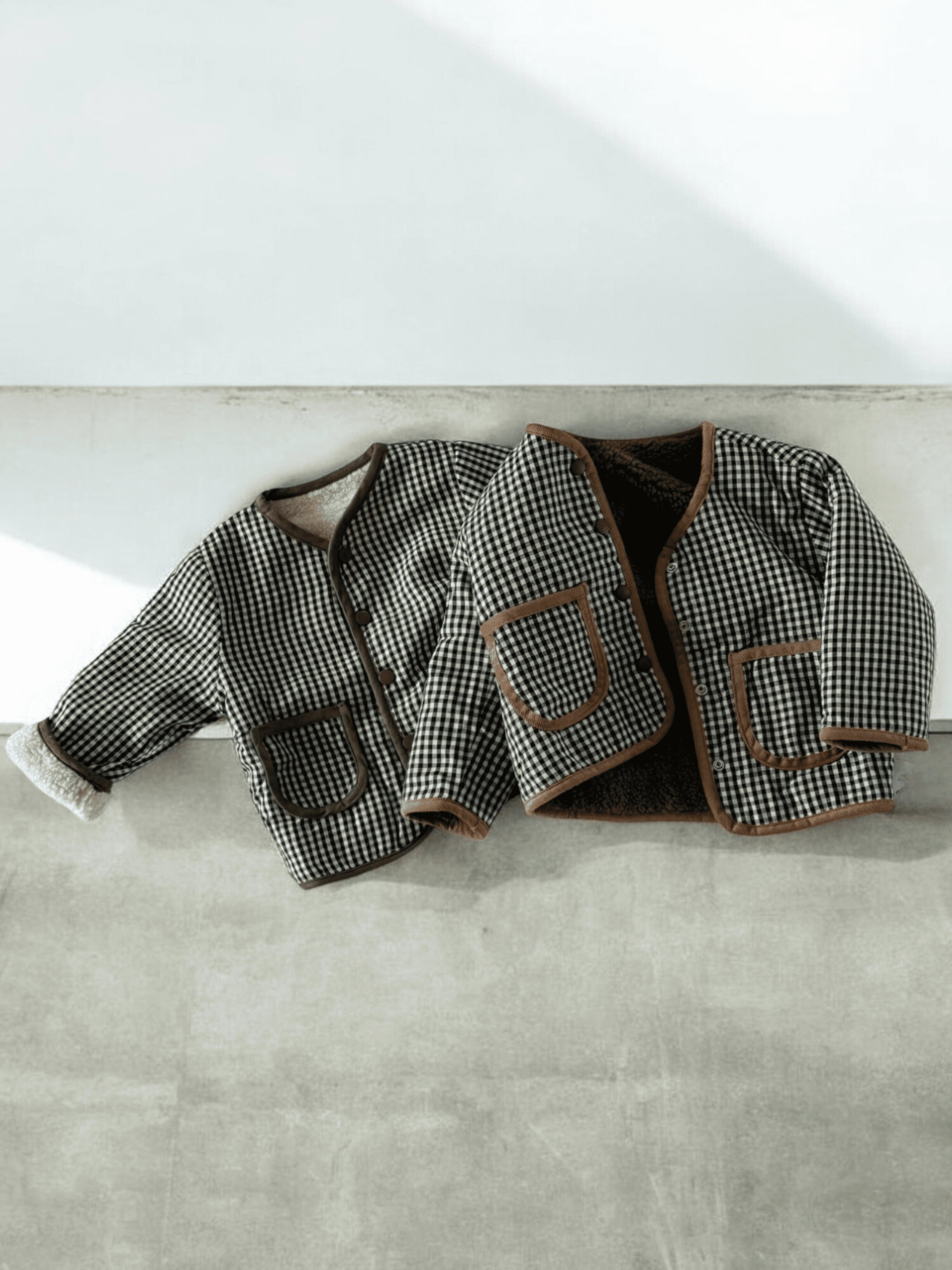 Confort Douillet Et Deux Looks en Un - Le Manteau Douillet Réversible Imitation Fourrure
