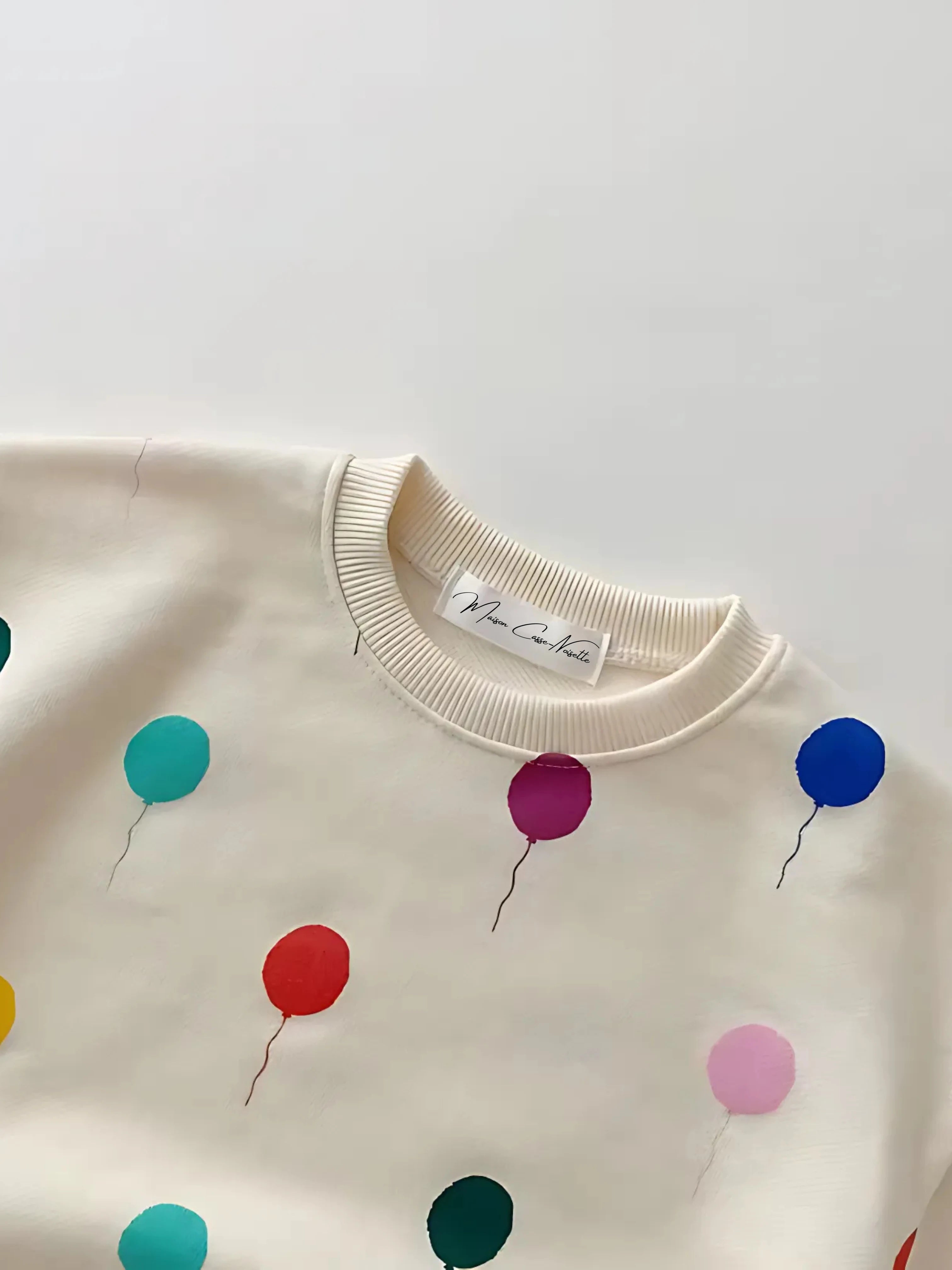 Motifs Ludiques & Tenue Confort au Quotidien - L'Ensemble Sweat & Pantalon Ballons Multicolores